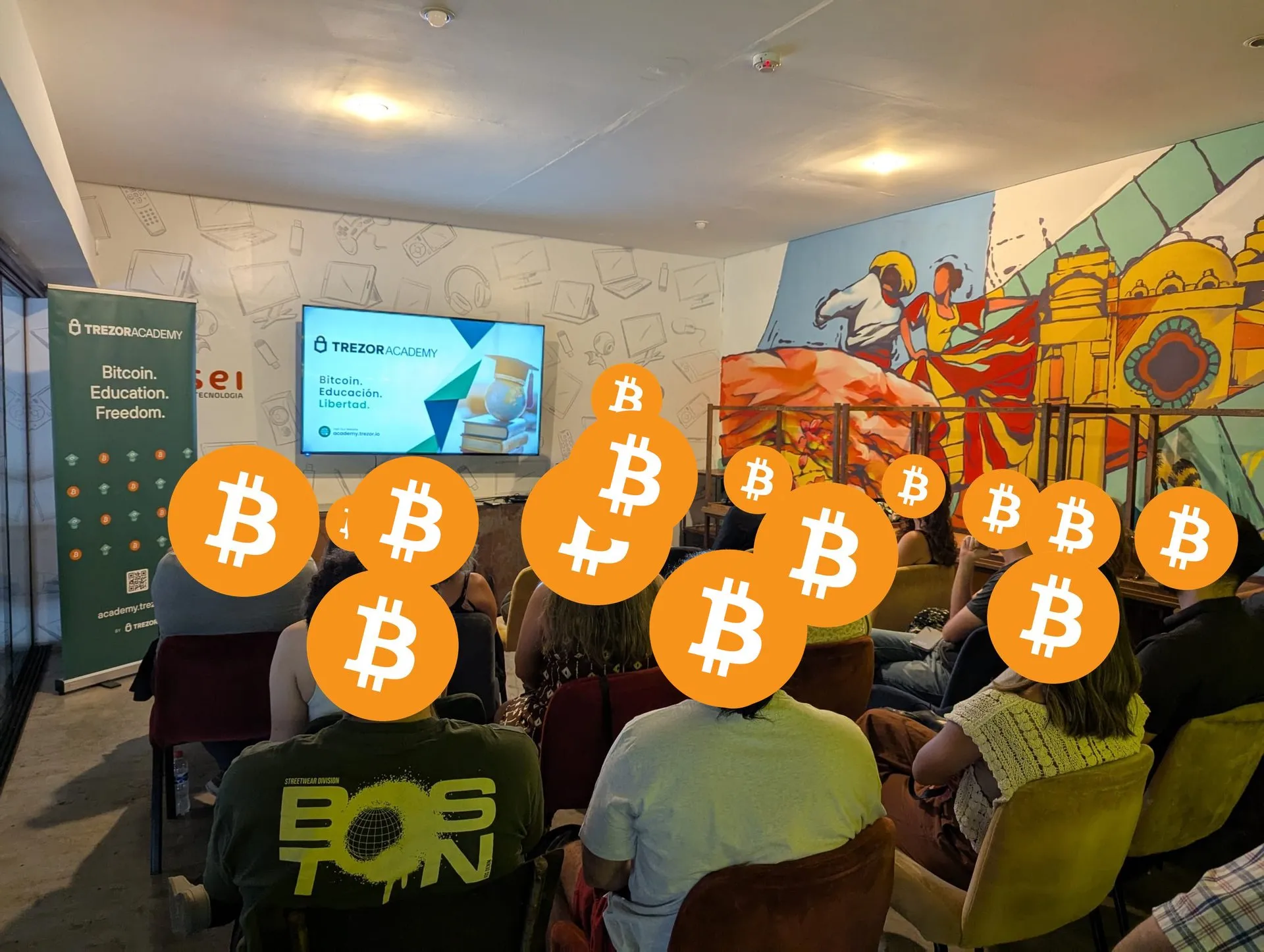 Taller con el banner de Trezor Academy a un costado